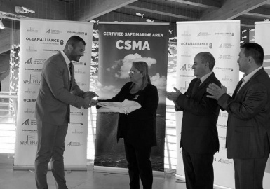 H.E. Marie-Louise Coleiro Preca, President of Malta, awarded the White Flag by Kristijan Curavić, OACM President